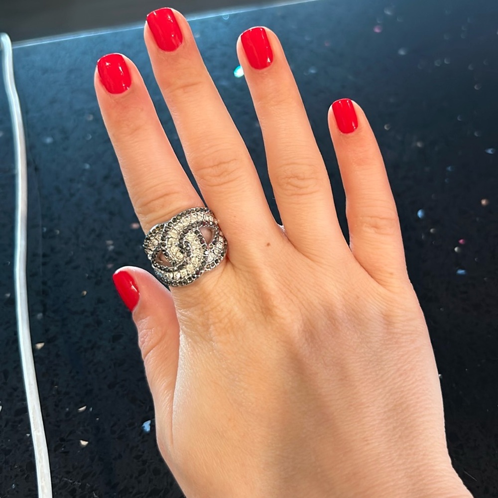Adorable ring with gray and silver stones.